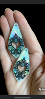 Holo beautiful detail heart cutout earrings