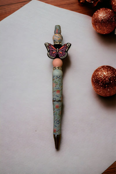 Blue and pink butterfly pen
