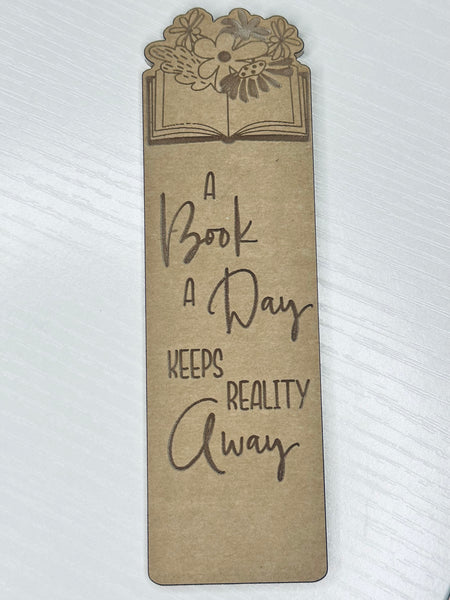 A book a day keeps reality away bookmark