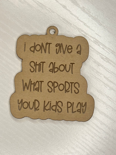 I don’t give a shot about what sports your kids play keychain