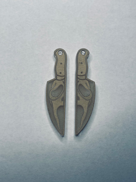 Spooky killer ghost knife earrings