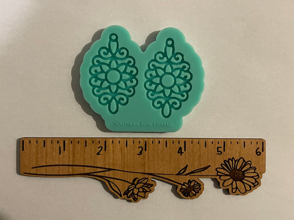 Cutout flower swirl earrings