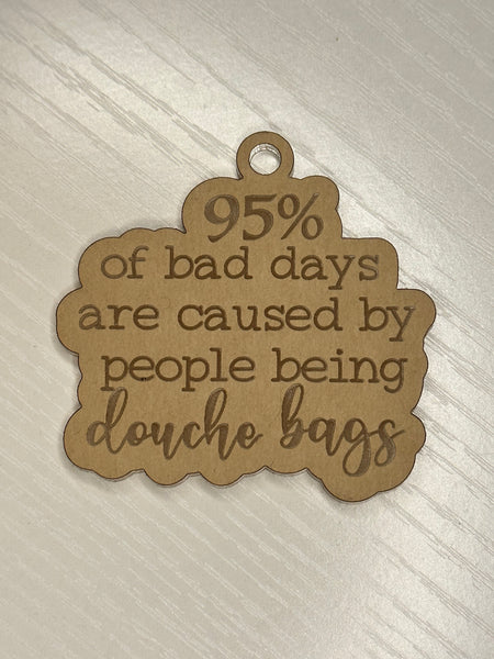 95% of bad days caused by douche bags keychain